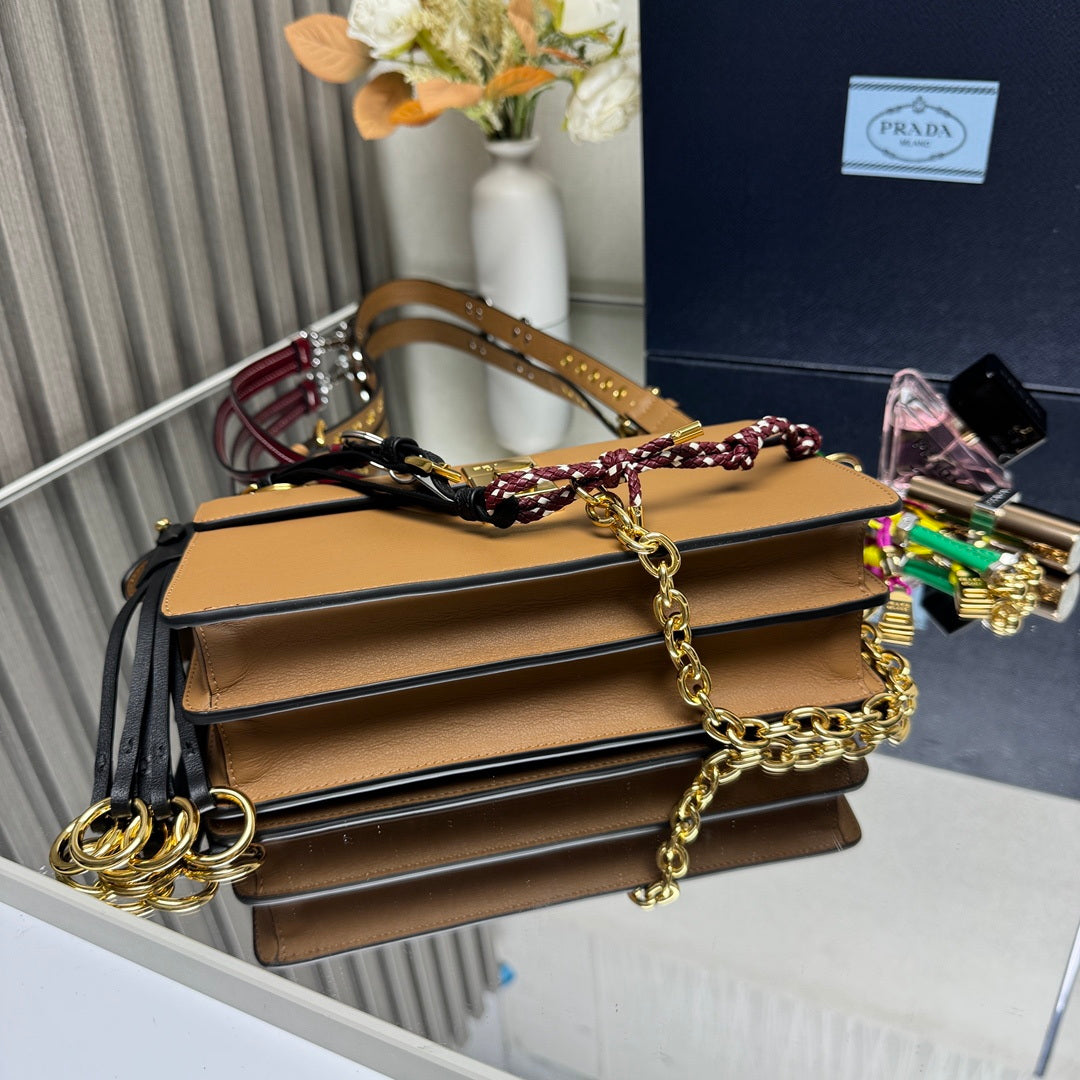 Prada 1BD379 Soft Sound small leather shoulder bag with charms Brown