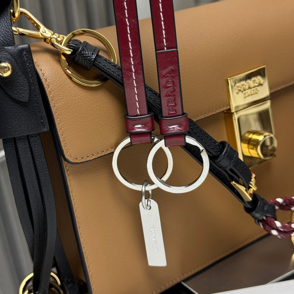 Prada 1BD379 Soft Sound small leather shoulder bag with charms Brown