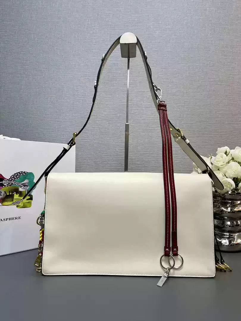 Prada 1BD378 Soft Sound large leather shoulder bag with charms White