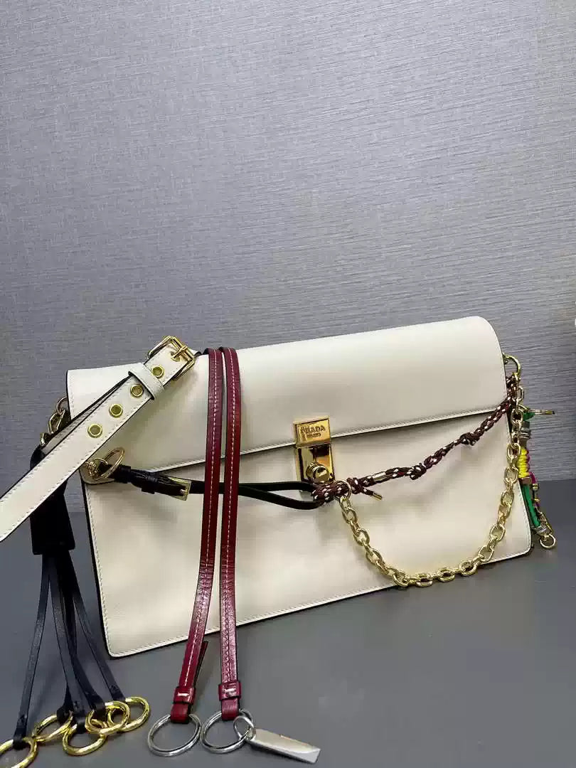 Prada 1BD378 Soft Sound large leather shoulder bag with charms White