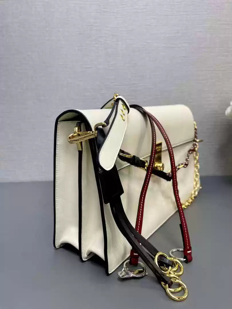 Prada 1BD378 Soft Sound large leather shoulder bag with charms White