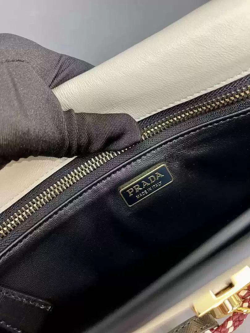 Prada 1BD378 Soft Sound large leather shoulder bag with charms White