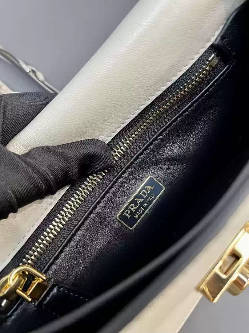 Prada 1BD379 Soft Sound small leather shoulder bag with charms White