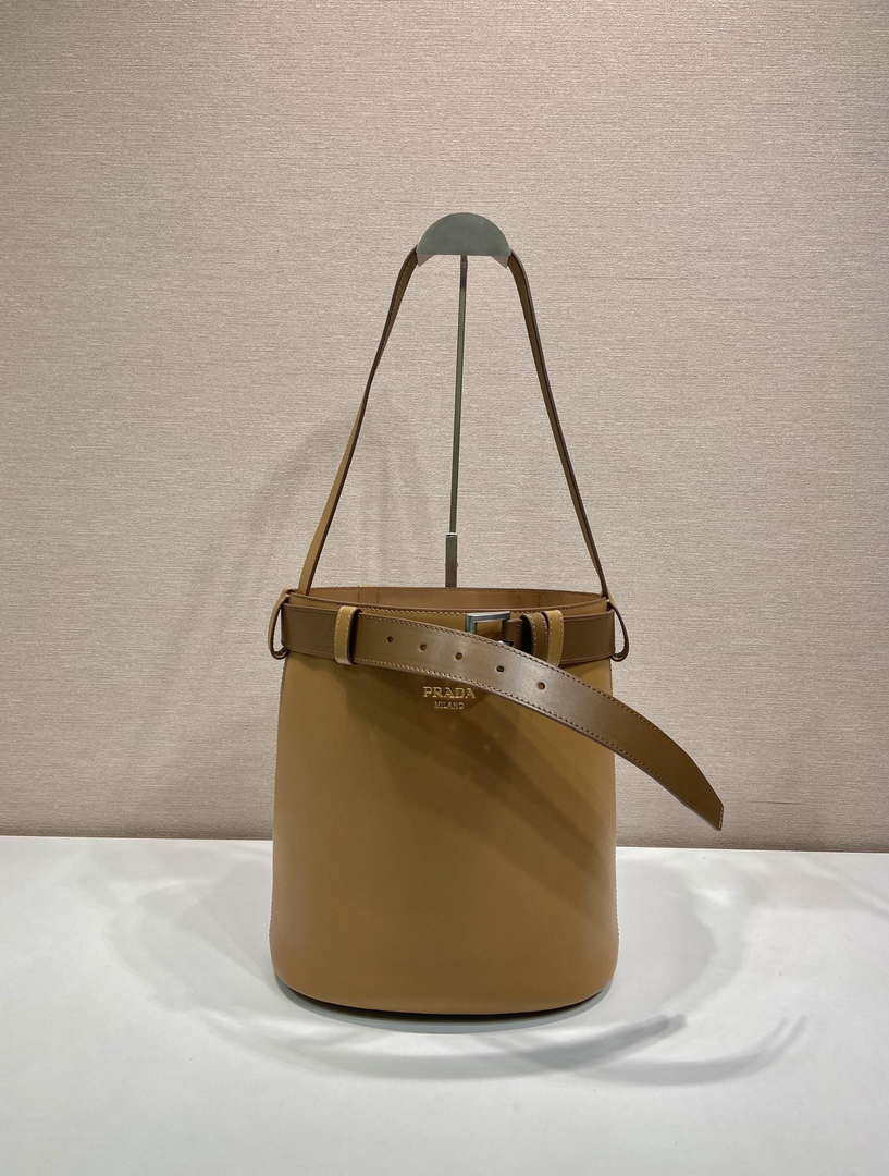 Prada 1BE085 Buckle leather bucket bag with belt Brown