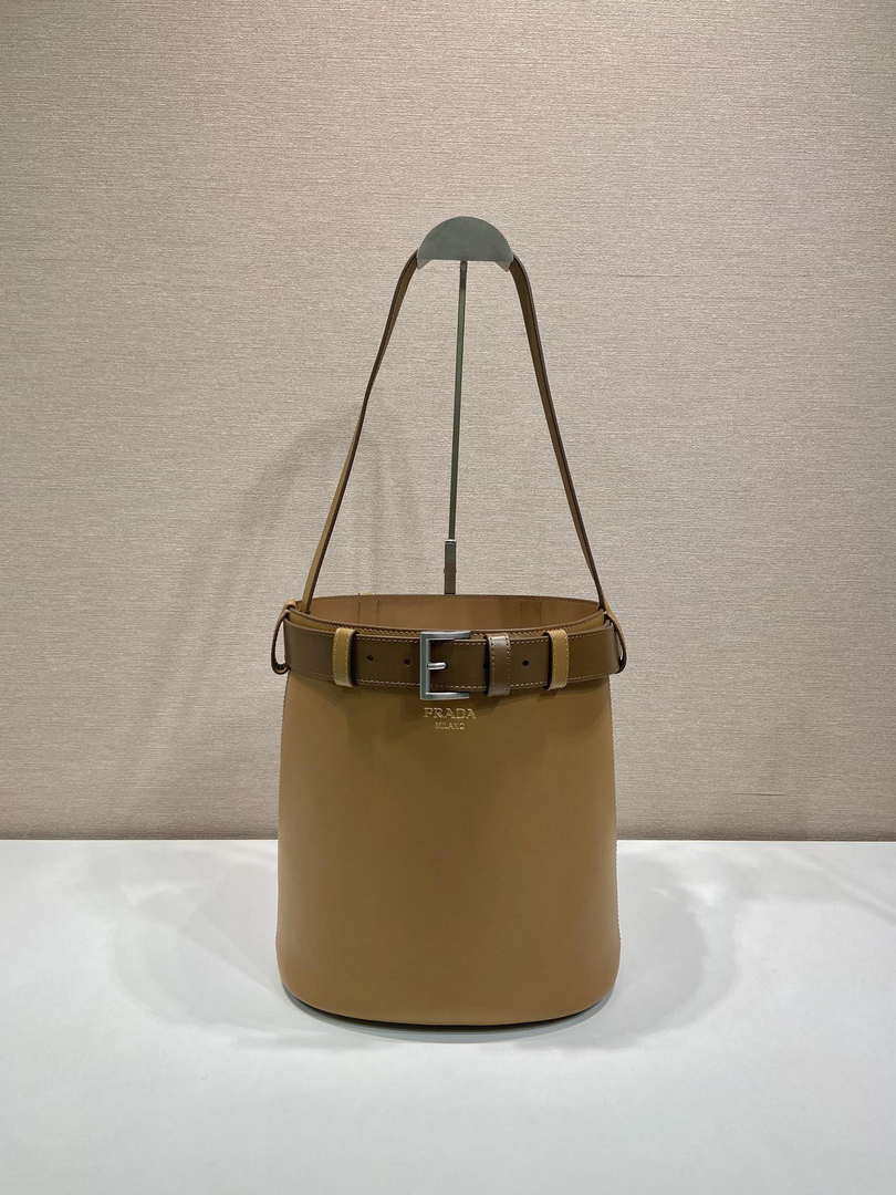 Prada 1BE085 Buckle leather bucket bag with belt Brown
