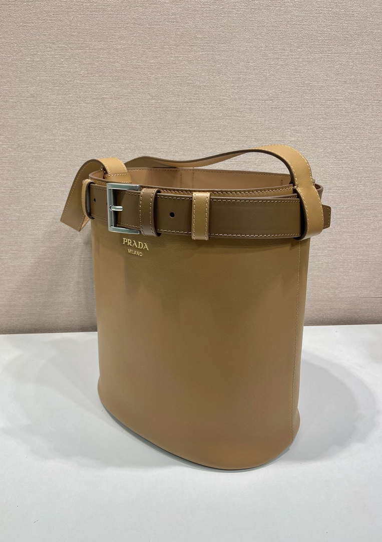 Prada 1BE085 Buckle leather bucket bag with belt Brown