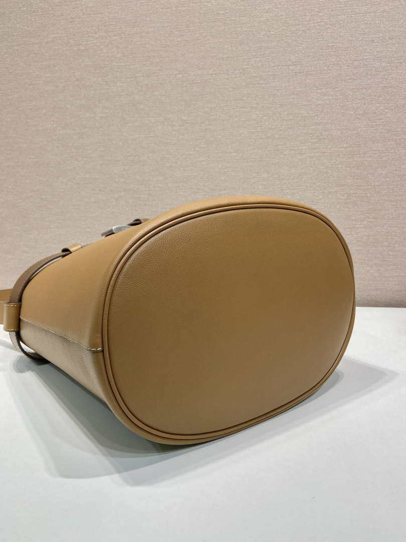 Prada 1BE085 Buckle leather bucket bag with belt Brown