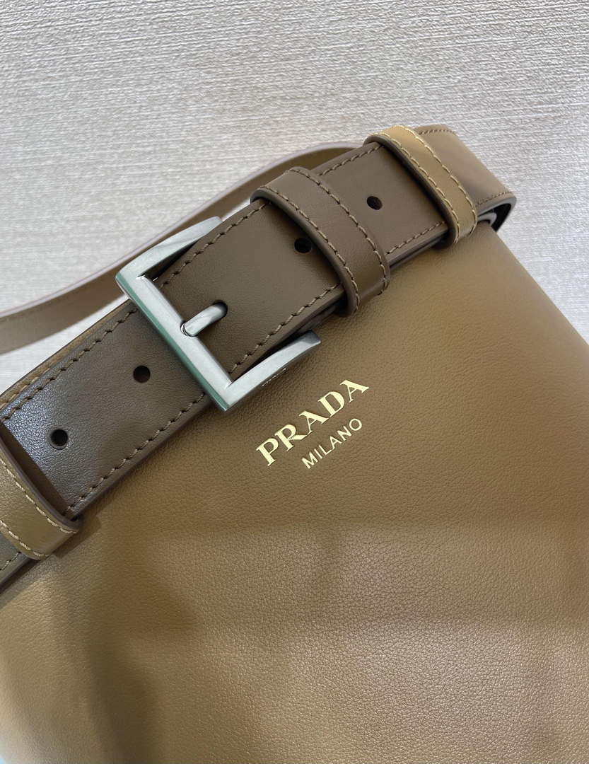 Prada 1BE085 Buckle leather bucket bag with belt Brown