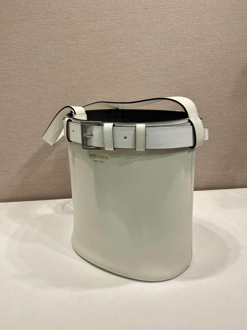 Prada 1BE085 Buckle leather bucket bag with belt White