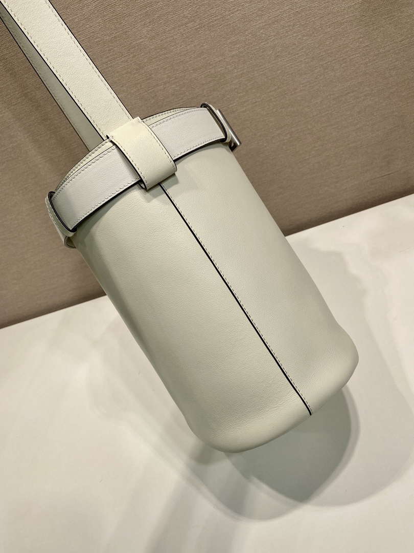 Prada 1BE085 Buckle leather bucket bag with belt White