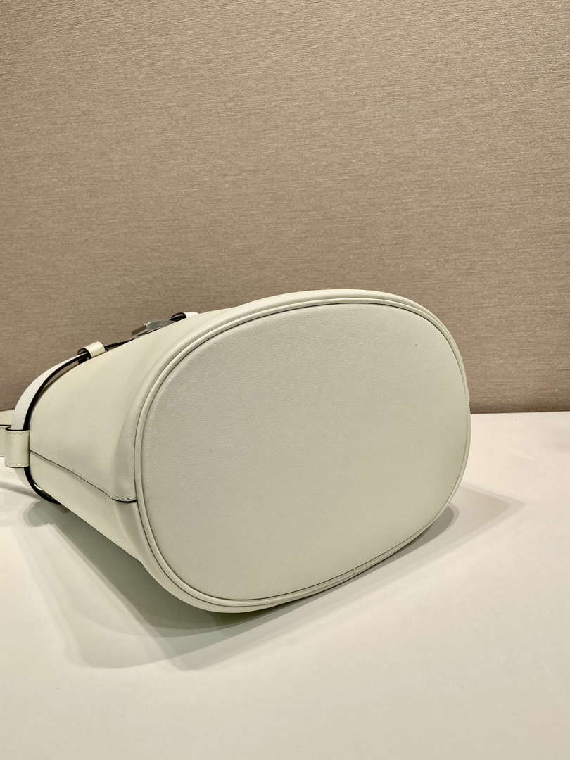 Prada 1BE085 Buckle leather bucket bag with belt White