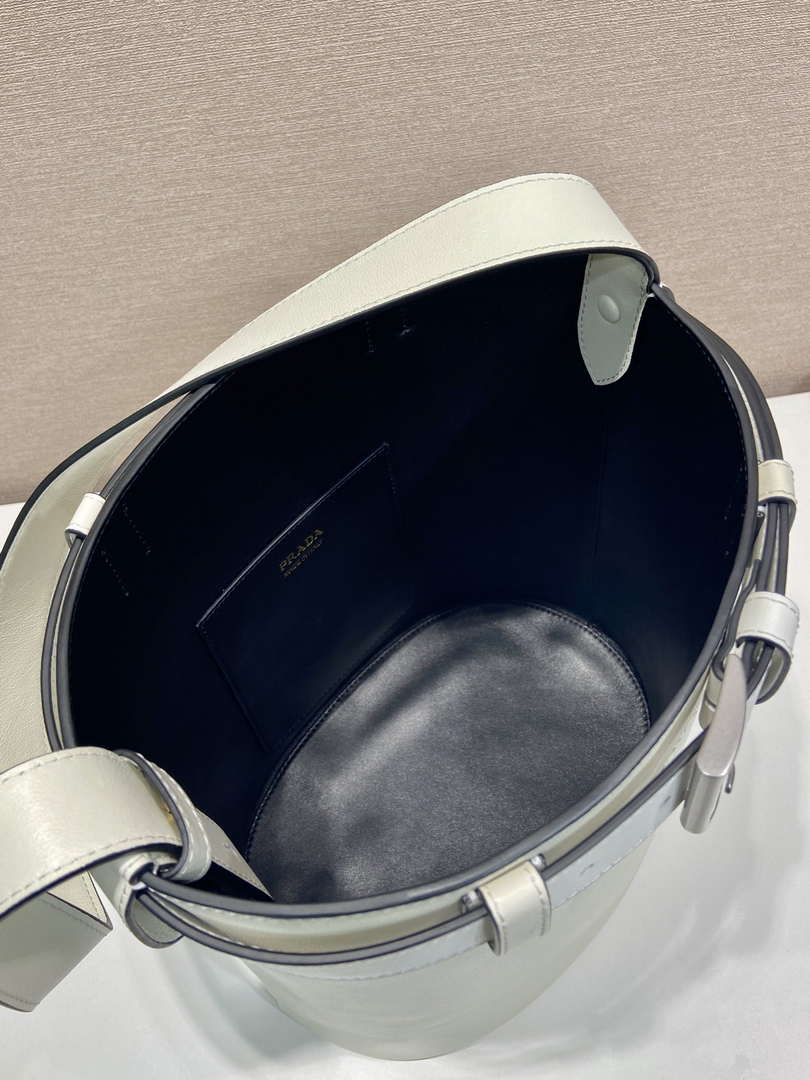 Prada 1BE085 Buckle leather bucket bag with belt White
