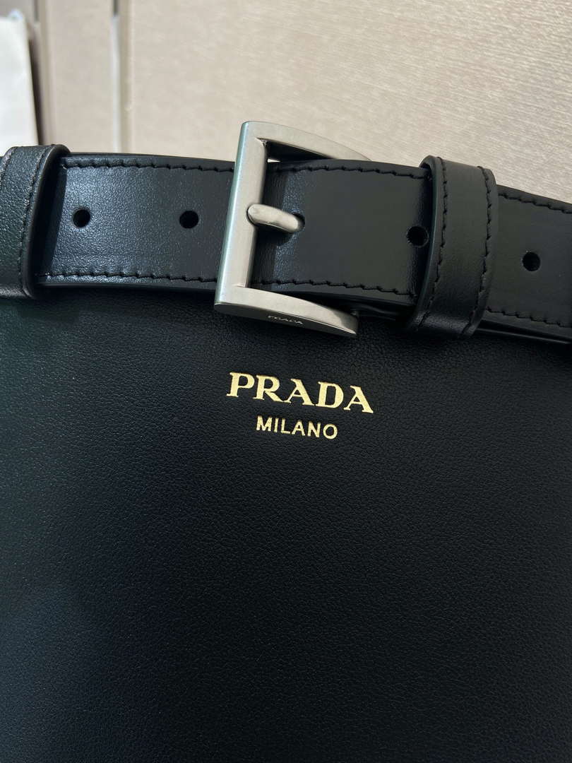 Prada 1BE085 Buckle leather bucket bag with belt Black