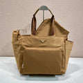 Prada  1BG102_RV44_F0002_V_OOO Re-Nylon baby bag Camel