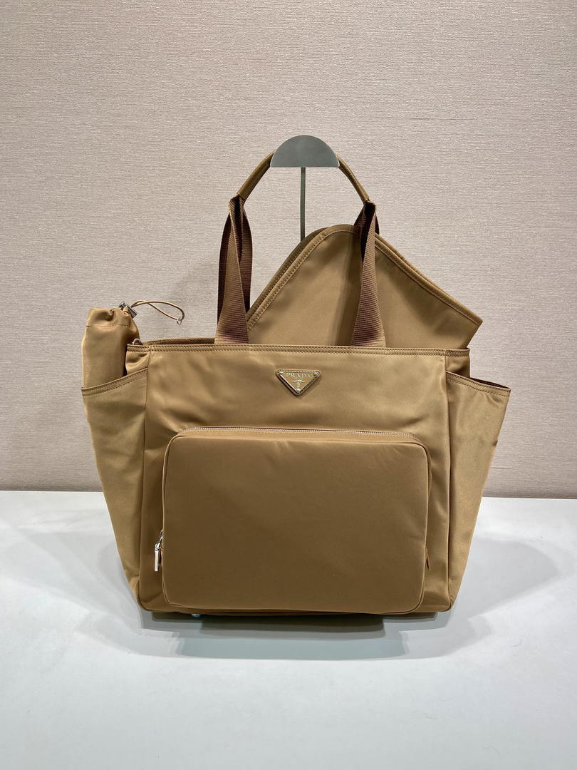 Prada  1BG102_RV44_F0002_V_OOO Re-Nylon baby bag Camel