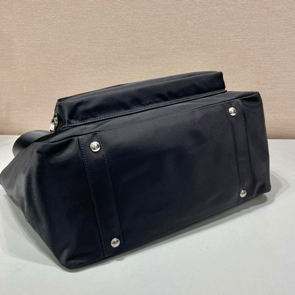 Prada  1BG102_RV44_F0002_V_OOO Re-Nylon baby bag Black