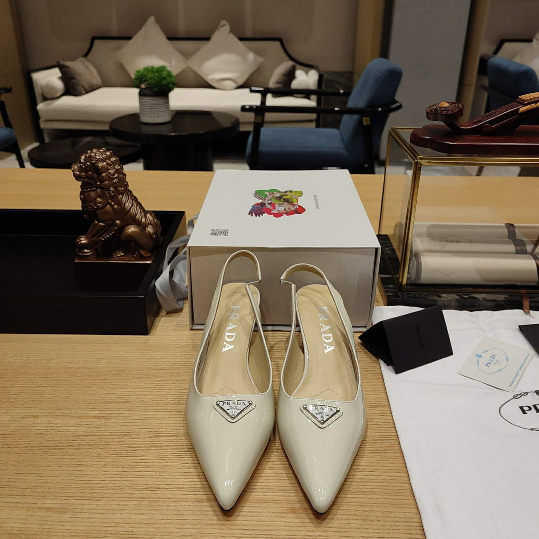Prada 1I153N Patent-leather slingback pumps P78571