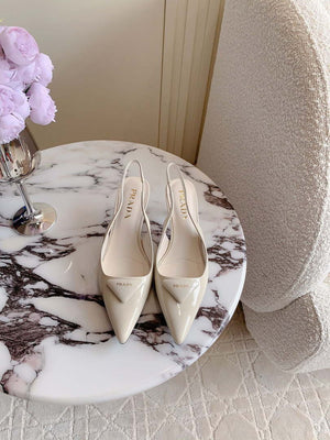 Prada 1I901M Women's Patent leather slingback pumps P10004 - Ivory / Euro 35=US 4 - View 1