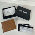 Prada 1MC025 Leather card holder Brown