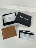 Prada 1MC025 Leather card holder Brown