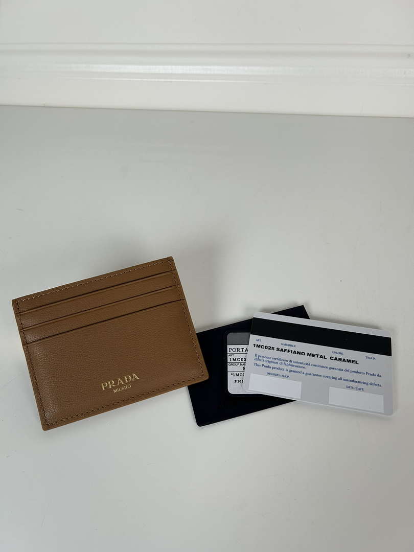 Prada 1MC025 Leather card holder Brown