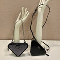 Prada 1NR015 Embellished satin and leather mini-pouch Black - Default Title - View 1