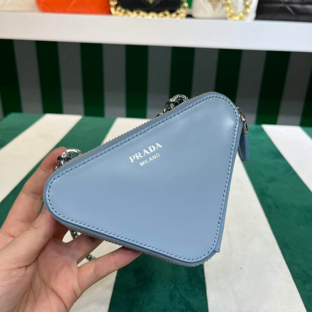 Prada 1NR015 Embellished satin and leather mini-pouch Blue