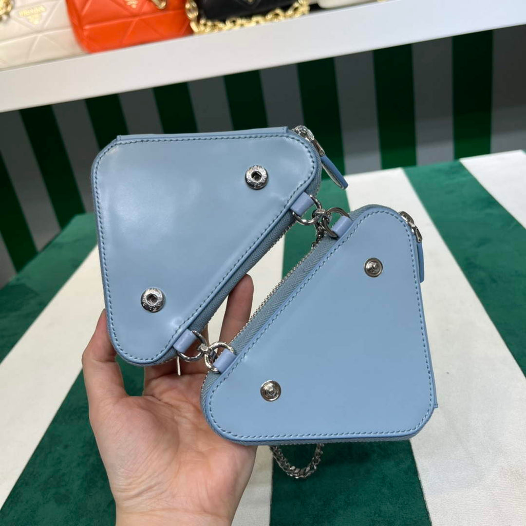 Prada 1NR015 Embellished satin and leather mini-pouch Blue