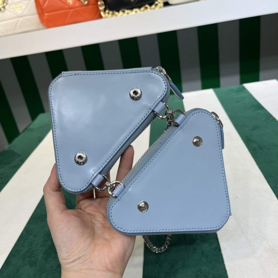 Prada 1NR015 Embellished satin and leather mini-pouch Blue
