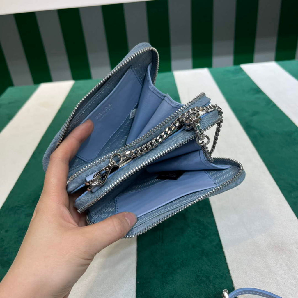 Prada 1NR015 Embellished satin and leather mini-pouch Blue