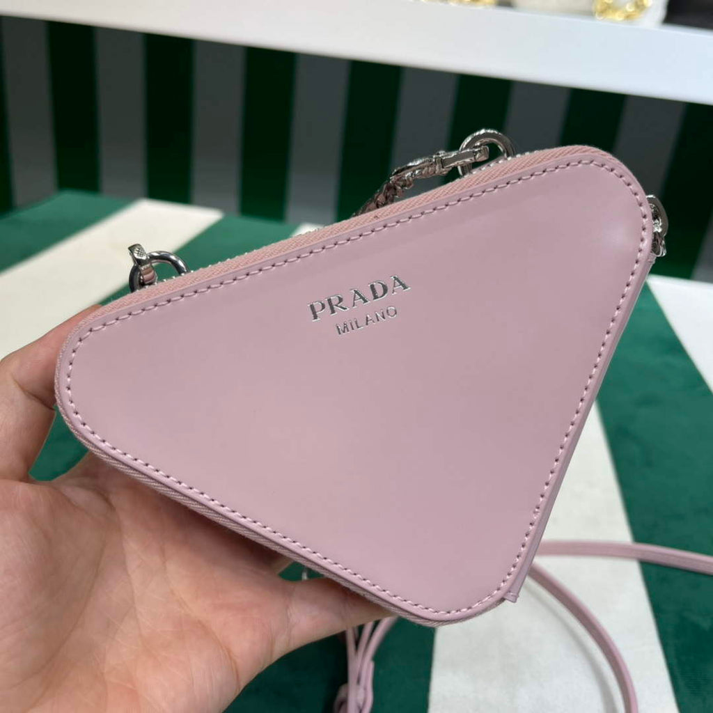 Prada 1NR015 Embellished satin and leather mini-pouch Pink
