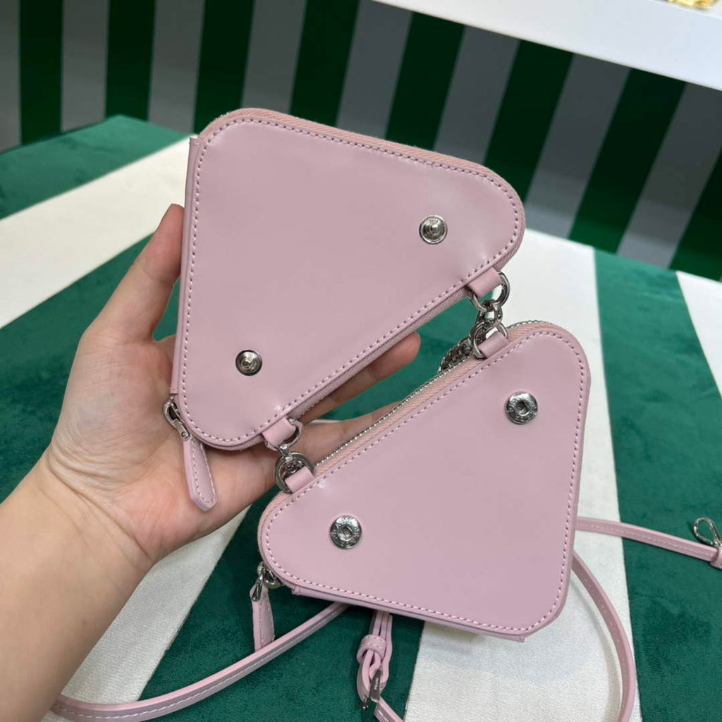 Prada 1NR015 Embellished satin and leather mini-pouch Pink