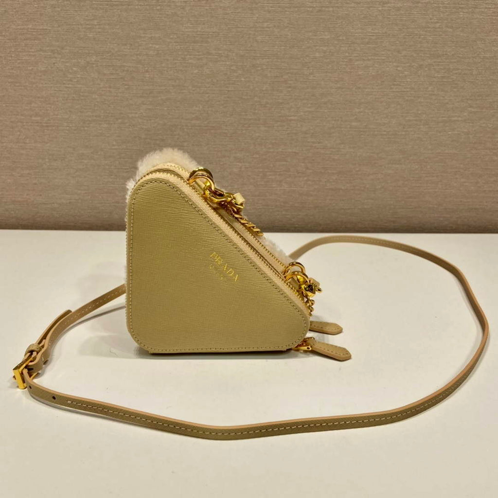 Prada 1NR015 Shearling and Saffiano leather mini-pouch Gold