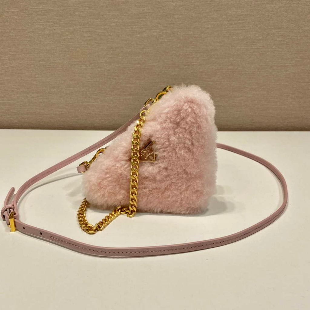 Prada 1NR015 Shearling and Saffiano leather mini-pouch Orchid pink