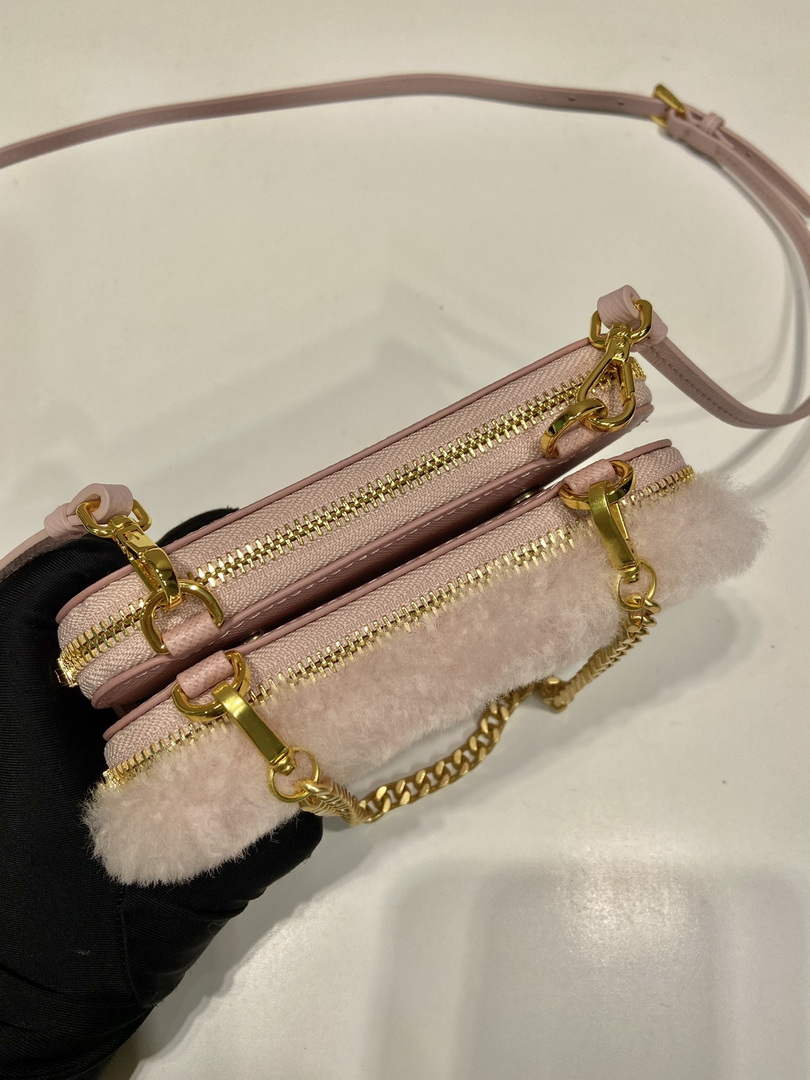 Prada 1NR015 Shearling and Saffiano leather mini-pouch Orchid pink