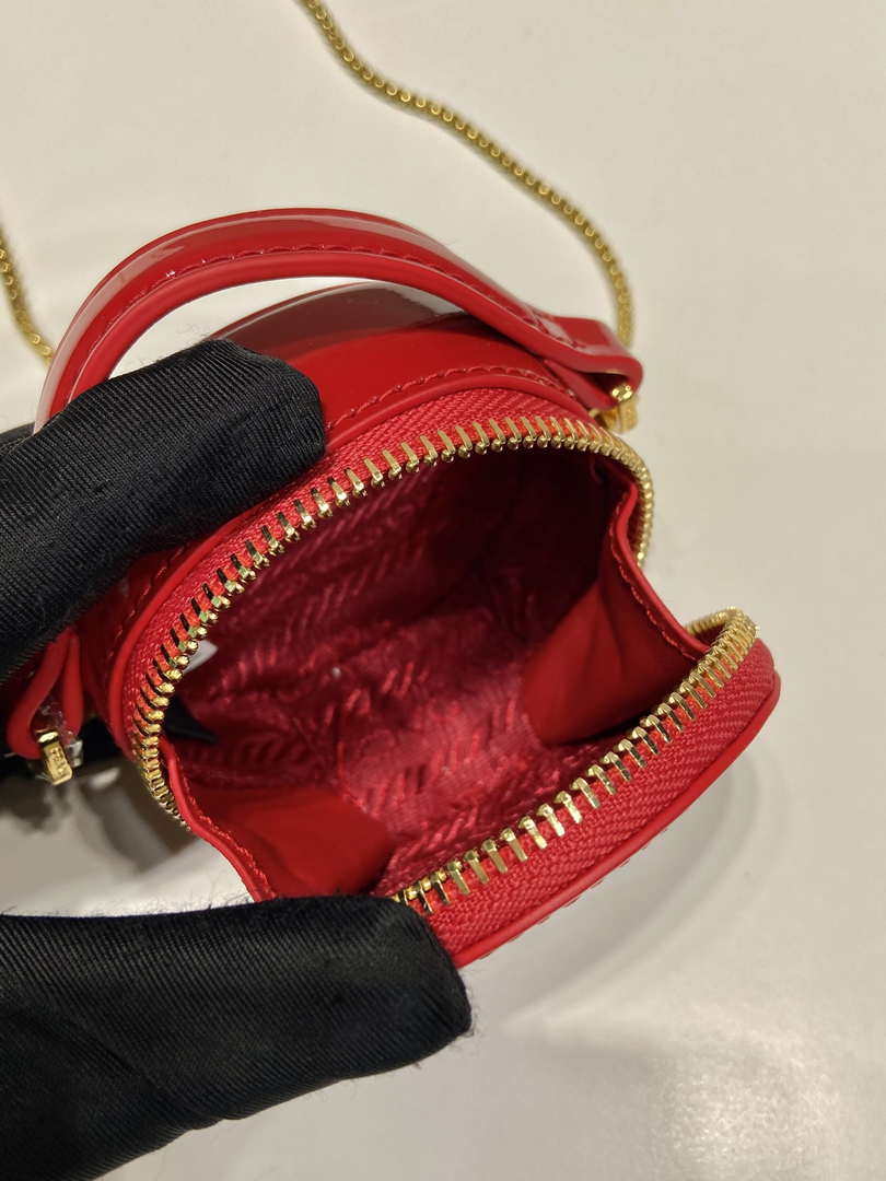 Prada 1NR023 Saffiano leather mini-pouch Red