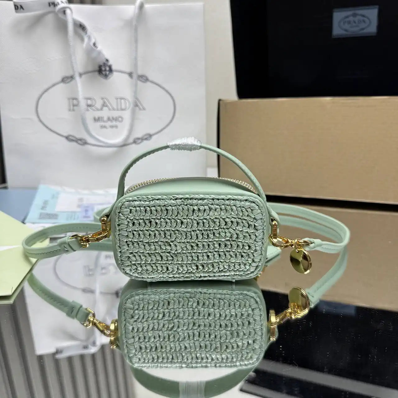 Prada 1NR025 Crochet and leather mini-pouch Green
