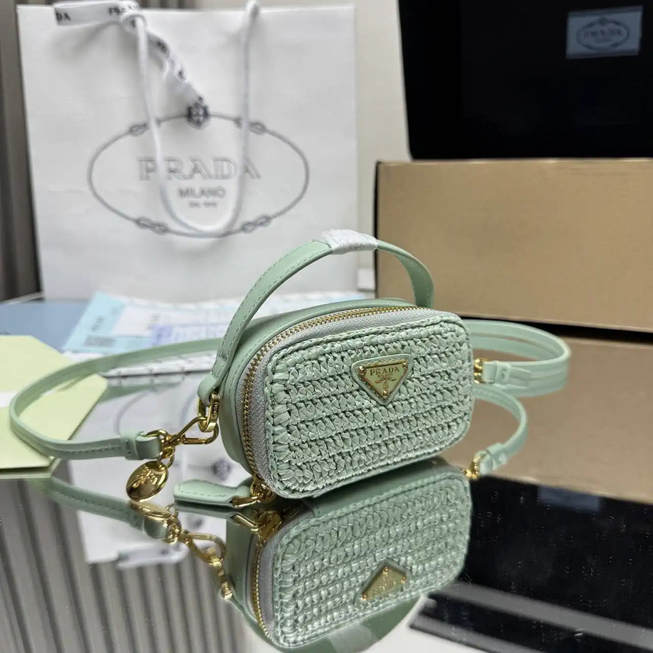 Prada 1NR025 Crochet and leather mini-pouch Green