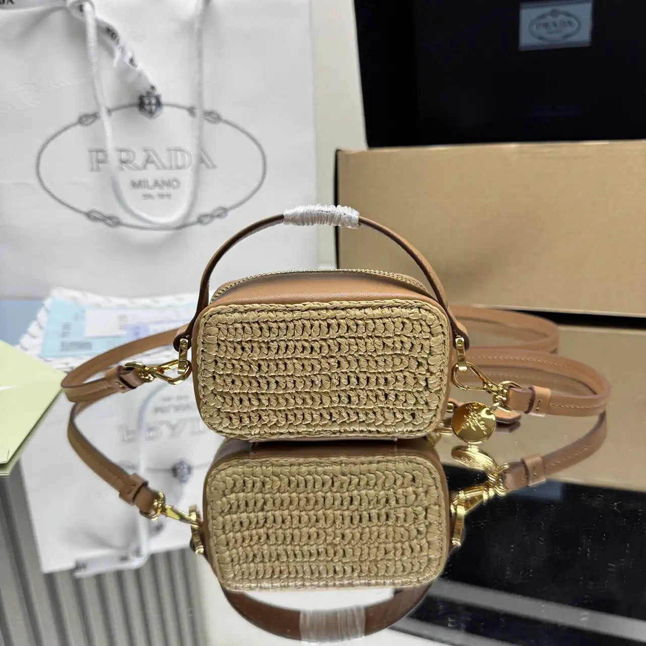 Prada 1NR025 Crochet and leather mini-pouch Natural