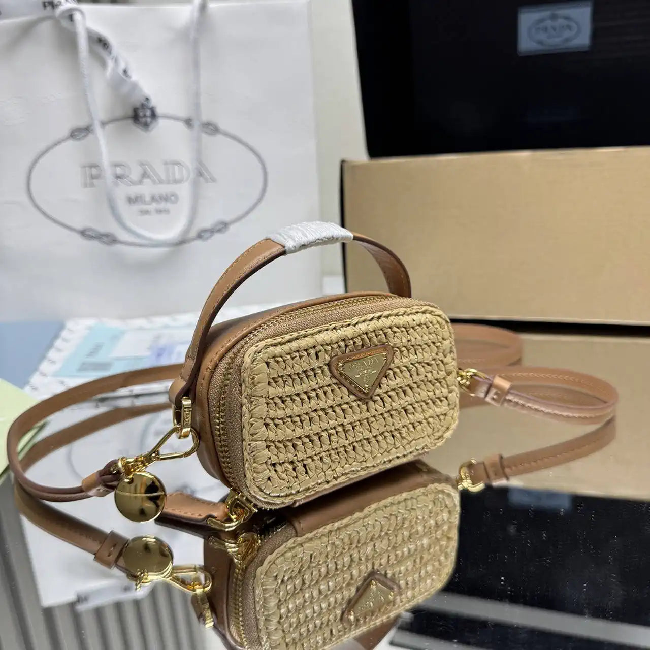Prada 1NR025 Crochet and leather mini-pouch Natural