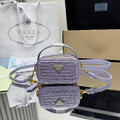 Prada 1NR025 Crochet and leather mini-pouch Purple