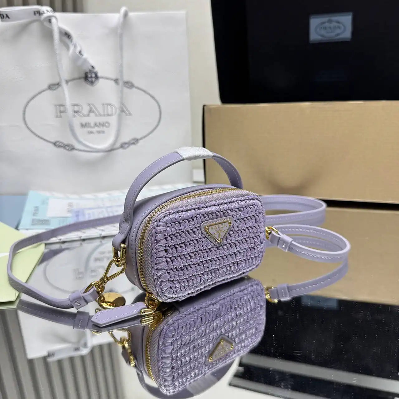 Prada 1NR025 Crochet and leather mini-pouch Purple