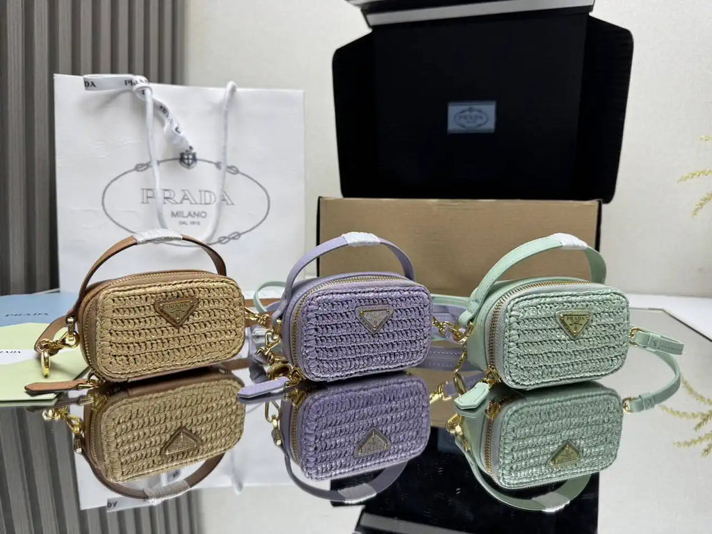 Prada 1NR025 Crochet and leather mini-pouch Purple