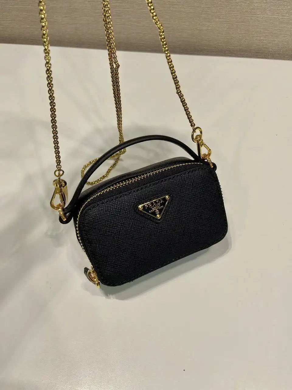 Prada 1NR025 Saffiano leather mini-pouch Black
