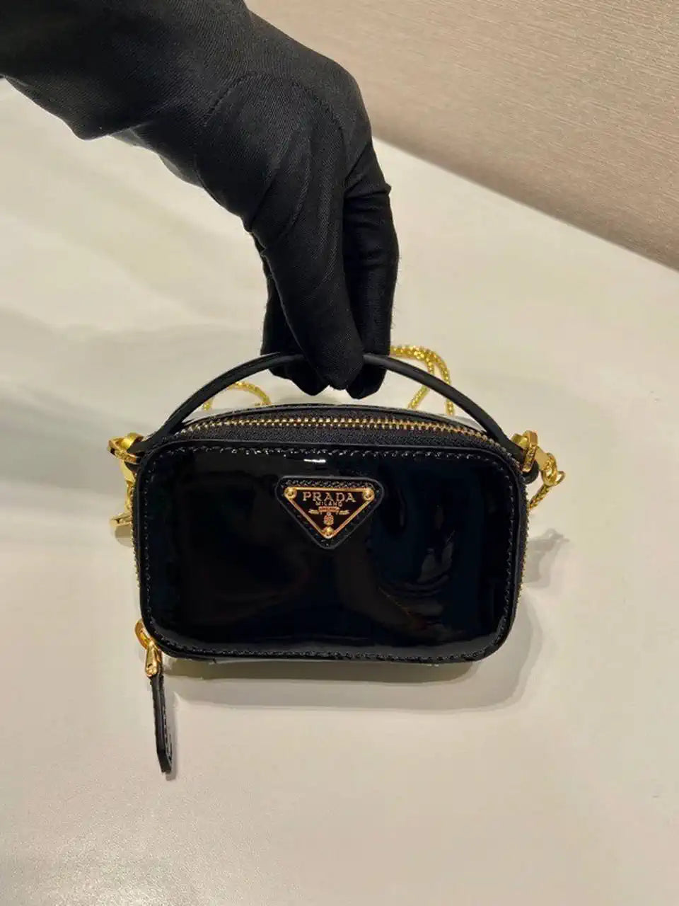 Prada 1NR025 Patent leather mini-pouch Black