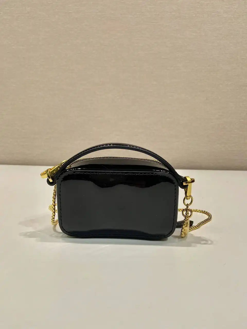 Prada 1NR025 Patent leather mini-pouch Black