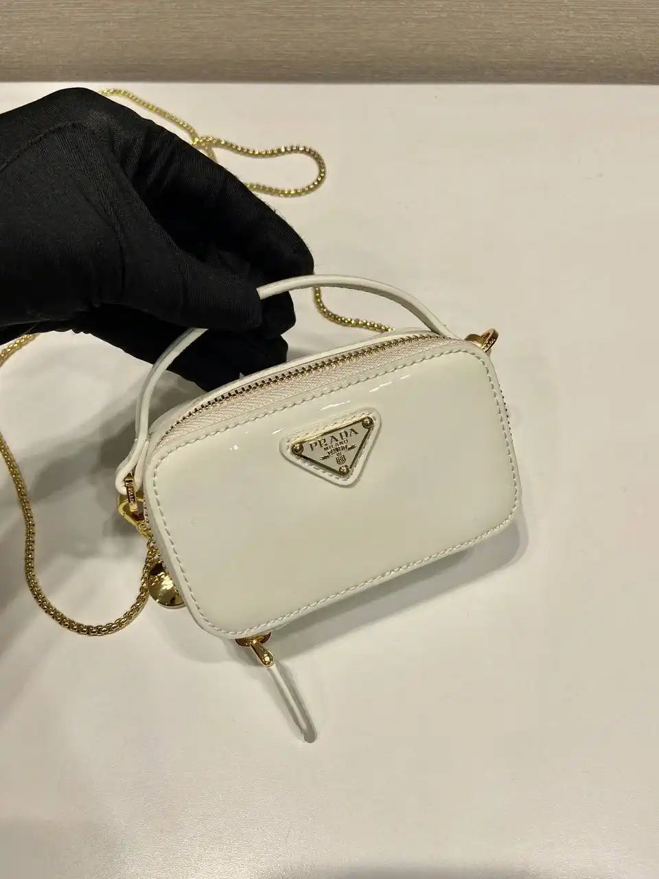 Prada 1NR025 Patent leather mini-pouch White