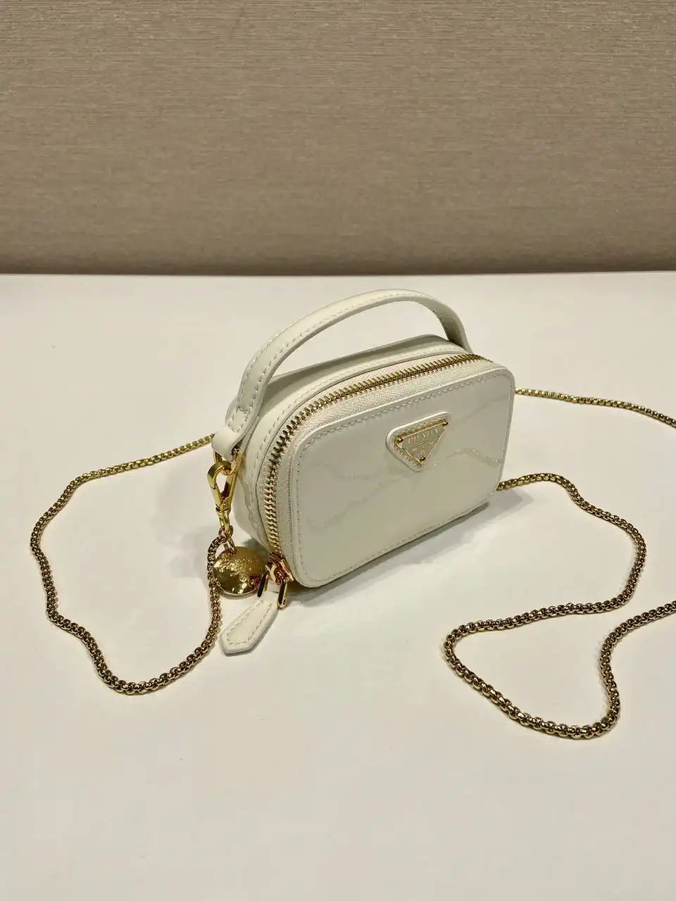 Prada 1NR025 Patent leather mini-pouch White