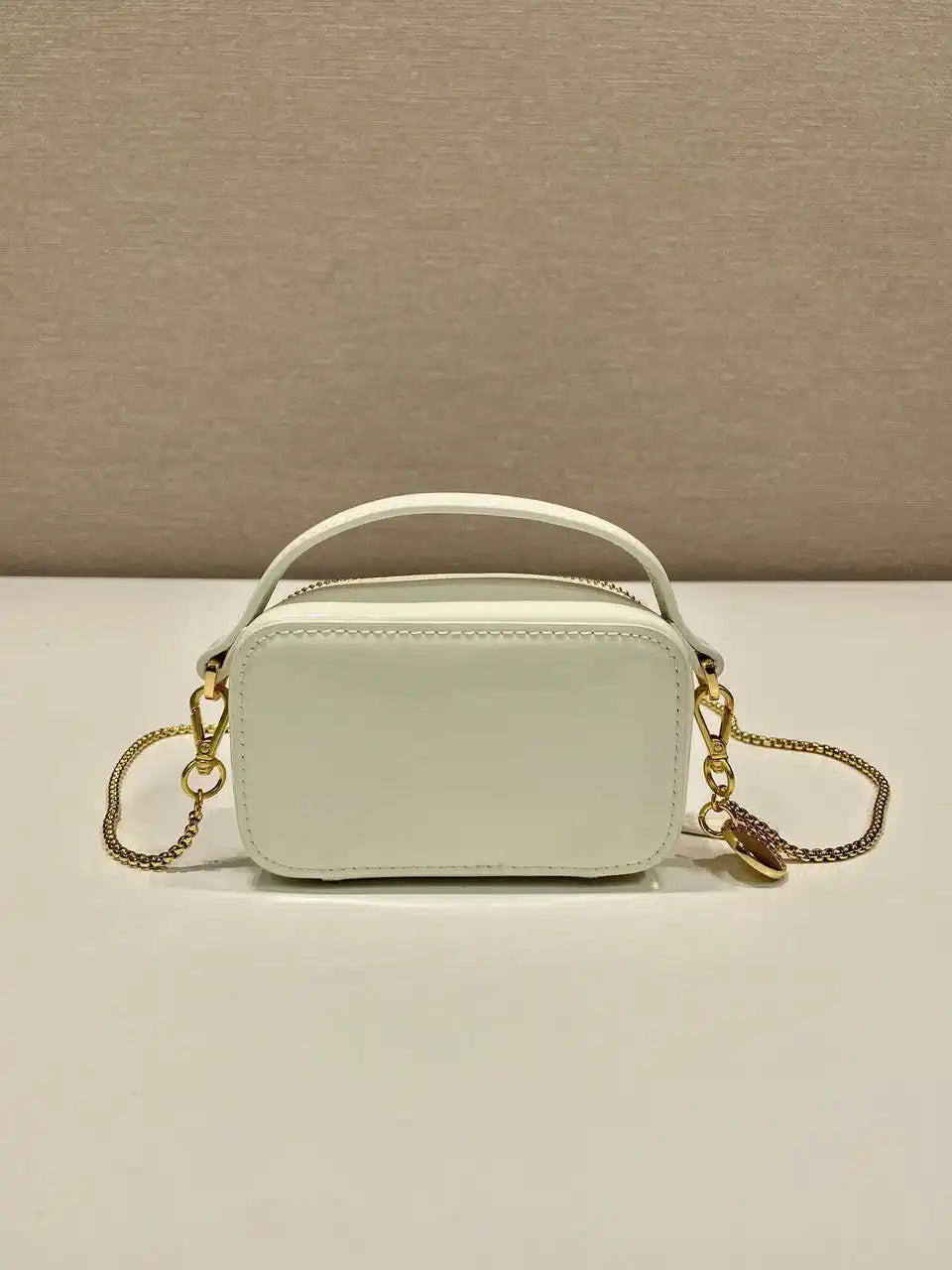 Prada 1NR025 Patent leather mini-pouch White