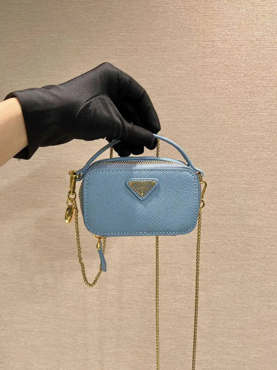 Prada 1NR025 Saffiano leather mini-pouch Blue